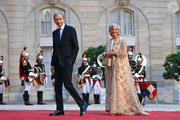 "J’ai une liberté totale de tout ce que je fais, il me laisse tout mon espace et toute ma liberté."

Bernard Arnault, Pdg de LVMH et sa femme Hélène Mercier-Arnault - Arrivées au dîner d'état au palais de l'Elysée à Paris en l'honneur de la visite du roi et de la reine de Belgique en France le 14 octobre 2024.

© Federico Pestellini / Panoramic / Bestimage