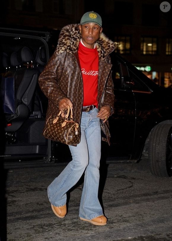 Exclusif - Pharrell Williams, nouvel ambassadeur de bonne volonté de l'Unesco, et sa femme Helen Lasichanh vont dîner dans un restaurant de Paris le 17 décembre 2024.