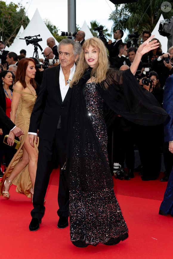 Bernard-Henri Lévy, Arielle Dombasle - Montée des marches du film « Partir un jour » pour la cérémonie d’ouverture du 78ème Festival International du Film de Cannes, au Palais des Festivals à Cannes. Le 13 mai 2025
© Olivier Borde / Bestimage