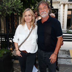 Catherine et Olivier Marchal - Cocktail à l'occasion des 2 ans de la boutique du Joaillier Heurgon à Paris le 27 juin 2023. © Christophe Clovis / Bestimage