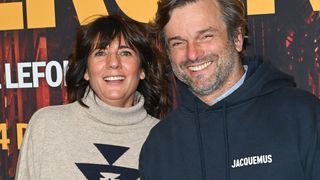 Estelle Denis et Raymond Domenech : Leur fils Merlin, parfait mélange de ses parents, pose avec sa mère... Le compagnon navigateur de l'animatrice est de la partie