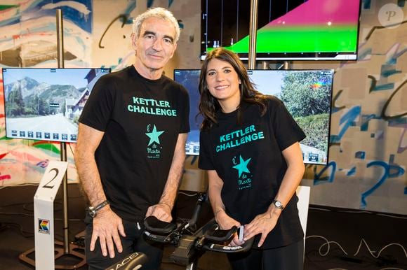 Raymond Domenech et sa compagne Estelle Denis (marraine de l'association "l'Etoile de Martin) - 2ème édition du "Kettler Challenge pour l'Etoile de Martin" à l'hôtel Molitor à Paris, le 21 mars 2016.  © Olivier Borde/Bestimage