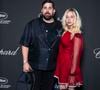L’actrice de 26 ans est apparue dans une robe rouge mêlant subtilement satin et dentelle, une silhouette sophistiquée qui contrastait avec l’allure plus décontractée de l’humoriste

Artus et Kim Higelin au dîner du Trophée Chopard au Carlton Beach Club lors du 79ème Festival International du Film de Cannes le 15 mai 2026.
© Olivier Borde / Bestimage