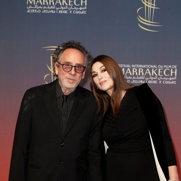 Tim Burton et Monica Bellucci au photocall de la cérémonie d'ouverture et à la projection du film "L'Ordre" lors du 21ème Festival international du film de Marrakech, le 29 novembre 2024j à Marrakech, Maroc. © Dominique Jacovides/Bestimage