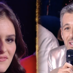 Pourtant, dès les premiers mots du directeur de la Star Academy, Jeanne laisse transparaître une certaine hésitation.

Jeanne et Michael Goldman lors du prime de la "Star Academy" spécial battle sur TF1 le 20 décembre 2025