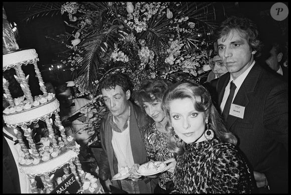 Philippe Léotard, Nathalie Baye, Catherine Deneuve au Fouquet's pour la soirée des César 1983 ©AGENCE / BESTIMAGE
