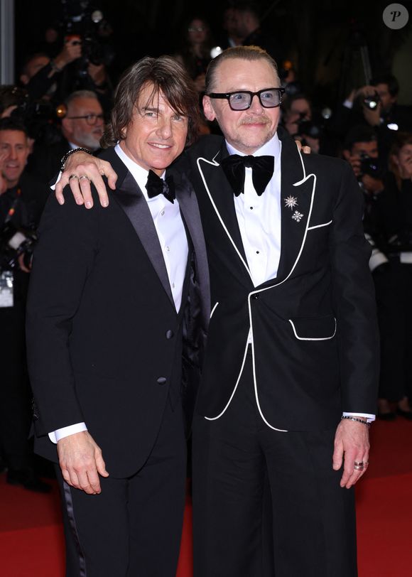 Tom Cruise, Simon Pegg - Descente des marches du film « Mission Impossible : The Final Reckoning » lors du 78ème Festival International du Film de Cannes, au Palais des Festivals à Cannes. Le 14 mai 2025
© Denis Guignebourg / Bestimage