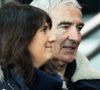Raymond Domenech et sa compagne Estelle Denis - People au quart de finale de la coupe de la ligue entre le Psg et Guingamp au Parc des Princes à Paris le 9 janvier 2019. Le Psg s'est incliné 2-1.  © Cyril Moreau/Bestimage