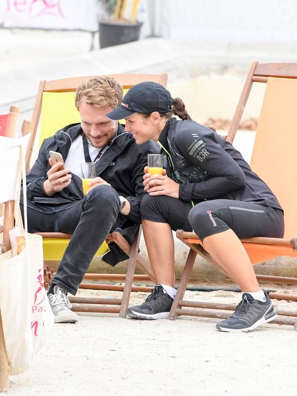 Lorie (Laure Pester) et son compagnon Roby Schinasi - Vingtième édition de la course La Parisienne à Paris, France, le 11 septembre 2016. © Pierre Perusseau/Bestimage