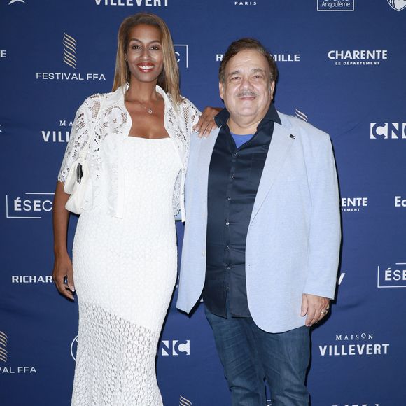 Marie-Setra Badini Duran et Didier Bourdon à la Cérémonie de remise des prix au théâtre d'Angoulême.
La 18ème édition du festival du Film Francophone d'Angoulême, samedi 30 août 2025. 
© Christophe Aubert via Bestimage