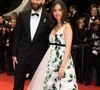 Si le cinéma était à l'honneur, la conversation a rapidement dérivé vers le football, terre de son célèbre époux Karim Benzema.

Karim Benzema et sa compagne Lyna Khoudri à la descente des marches du film " 13 jours 13 nuits " lors du 78ème Festival International du Film de Cannes. Le 23 mai 2025
© Olivier Borde/ Bestimage