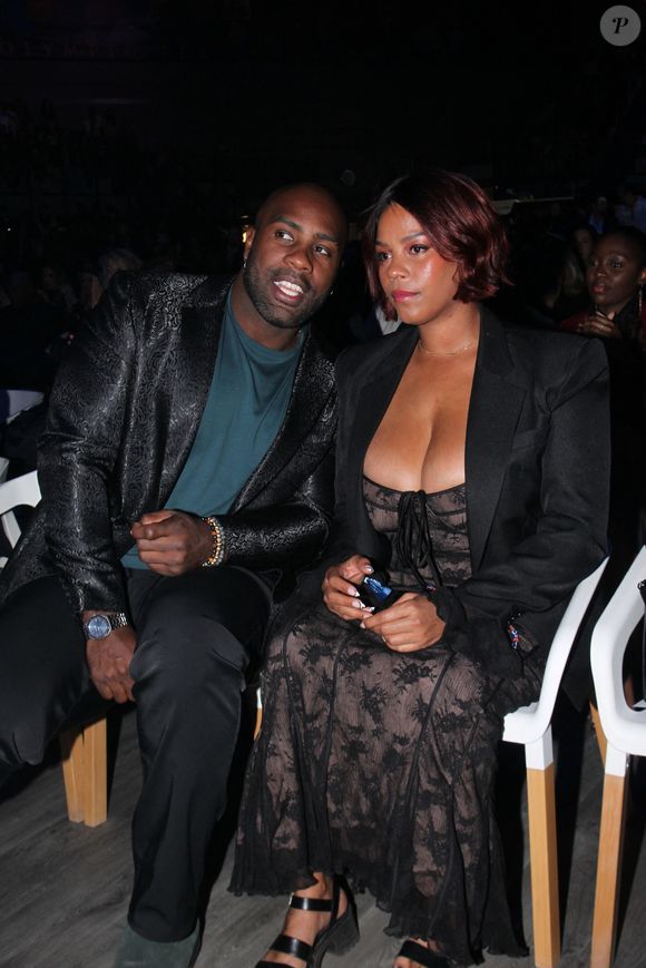 Teddy Riner et sa femme Luthna - Soirée de remerciement de Teddy Riner à la Maison du judo à Montrouge, le 29 novembre 2024. Devant une centaine d'invités, Le champion olympique (11 fois) et champion olympique (5 fois) a tenu à remercier tous ceux qui l'ont soutenu tout au long de son impressionnante carrière, de son premier entraîneur en club jusqu’à sa femme et sa mère, en passant par sa psychologue de l’INSEP. Une vente aux enchères au profit de l'association de Teddy Riner a conclu la soirée. 
© Philippe Baldini / Bestimage