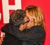 Marc Lavoine et Adriana Karembeu assistent à un photocall pour le Concerto For Peace d'Omar Harfouch au Théâtre des Champs-Elysées le 18 septembre 2024 à Paris.