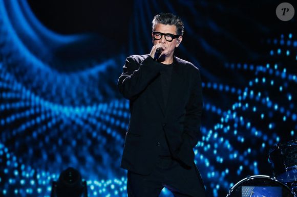 David Douillet a d'ailleurs été surpris par l’arrivée de Marc Lavoine sur le plateau, chantant "Toi mon amour". 

Exclusif - Marc Lavoine - Surprises - Enregistrement de l'émission "La Boîte à secrets", au Studio du Lendit, présentée par F.Bollaert et diffusée le 17 janvier sur France 3. Le 17 décembre 2024 © Christophe Clovis / Bestimage