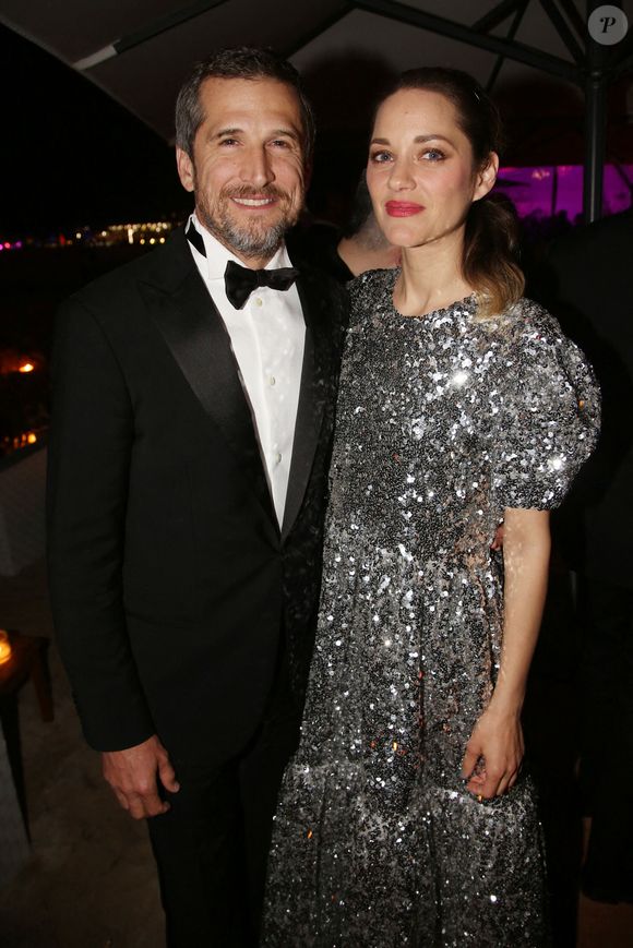 Guillaume Canet et Marion Cotillard assistent à l'After Party La Belle Epoque qui se tient à La Mome dans le cadre du 72e Festival de Cannes, le 20 mai 2019 à Cannes, France. Photo par Jerome Domine/ABACAPRESS.COM