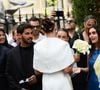La mannequin portait une robe blanche élégante, tandis que son mari était en costume bleu marine.

 Arrivées au mariage civil de Thylane Blondeau et Benjamin Attal à la mairie du 16ème arrondissement de Paris le 29 juin 2026.
Agence / Bestimage