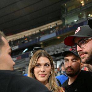 Iris Mitteneare, Antoine Dupont et son frère Clément Dupont -  Victoire des Toulousains en finale du Top 14, face à Montpellier (28 - 20) au stade de France, le 27 juin 2026. 
© Christian Liewig / Bestimage