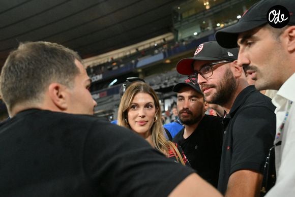 Iris Mitteneare, Antoine Dupont et son frère Clément Dupont -  Victoire des Toulousains en finale du Top 14, face à Montpellier (28 - 20) au stade de France, le 27 juin 2026. 
© Christian Liewig / Bestimage