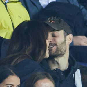 Exclusif - Louis Sarkozy et sa femme Natali Husic   - People en tribunes du match de Ligue 1 Uber Eats "PSG contre Reims" (1-1) au Parc des Princes à Paris le 29 janvier 2023. (AGENCE / BESTIMAGE).