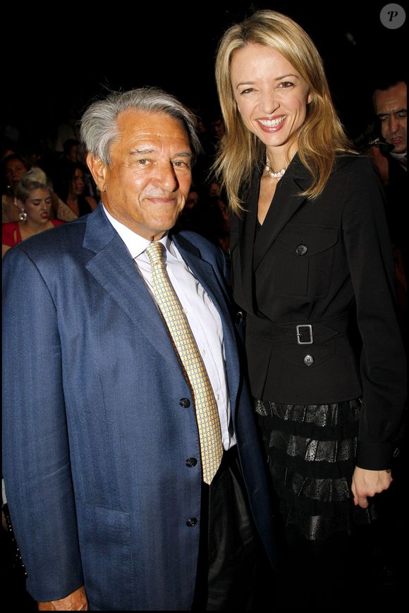 Baron Guy Ullens de Shooten, Delphine Arnault - au défilé de mode Christian Dior - Collection prêt à porter printemps - été automne 2011 à l'espace éphémère Tuileries. (RINDOFF-BORDE / BESTIMAGE).