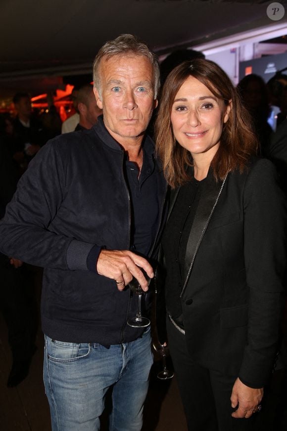 Franck Dubosc et Daniela Lumbroso assistant à l'Orange Party organisée à la Plage Majestic dans le cadre du 72e Festival de Cannes, le 18 mai 2019 à Cannes, France. Photo par Jerome Domine/ABACAPRESS.COM