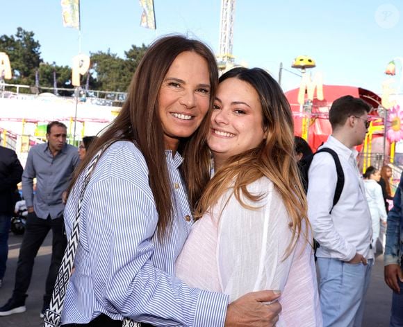 Nathalie Marquay Pernaut avec sa fille Lou Pernaut - Inauguration de la Foire du Trône 2025 à Paris le 4 avril 2025. 

© Cédric Perrin/Bestimage