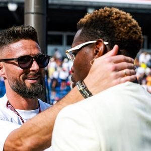 French footballers Olivier Giroud and Paul Pogba seen in the pitlane during the Formula 1 Grand Prix de Canada 2026, 6th round of the 2026 Formula One World Championship from June 5 to 7, 2026 on the Circuit de Monaco, in Monte-Carlo, Monaco - © PsnewZ/Bestimage