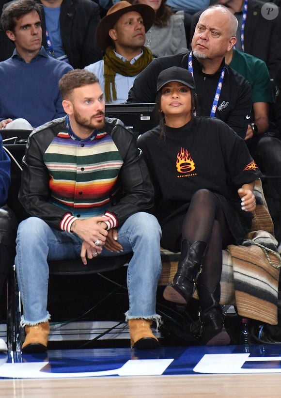 Matt Pokora (M. Pokora) et sa femme Christina Milian assistent au match 1 du NBA Paris Games 2025 à L'Accor Arena Bercy à Paris le 23 janvier 2025. © Veeren/Bestimage