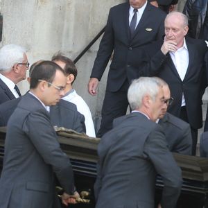 Monseigneur Di Falco, Pascal Desprez, Alain Delon - Sorties des obsèques de Mireille Darc en l'église Saint-Sulpice à Paris. Le 1er septembre 2017 © AGENCE / BESTIMAGE