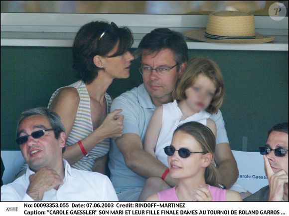 Carole Gaessler et son mari Franck avec leur fille Margaux - Tournoi de Roland Garros 2003.
© RINDOFF-MARTINEZ