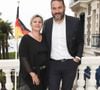 Bruce Toussaint et sa femme Catherine lors de l'inauguration de l'hôtel Barrière Le Grand Hôtel Dinard, après cinq mois de rénovation, à Dinard, France, le 15 juin 2019. L'établissement, propriété du groupe Barrière, a rouvert ses portes le 12 avril. Rénovation des cuisines, décoration, mobilier et espace bien-être repensés. L’hôtel 5 étoiles, construit en 1858, passe de 89 à 86 chambres pour créer une suite supplémentaire et deux suites juniors avec portes communicantes. Toutes ont été refaites du sol au plafond. © Coadic Guirec/Bestimage