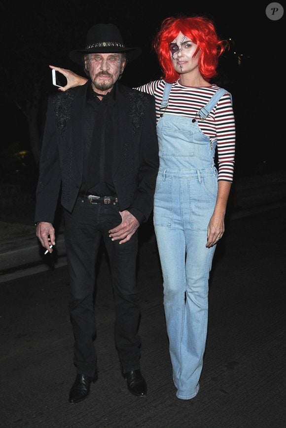 Johnny Hallyday et sa femme Laeticia Hallyday arrivent à la fête d'halloween de Kate Hudson à Brentwood le 28 octobre 2016. © Fameflynet Bestimage