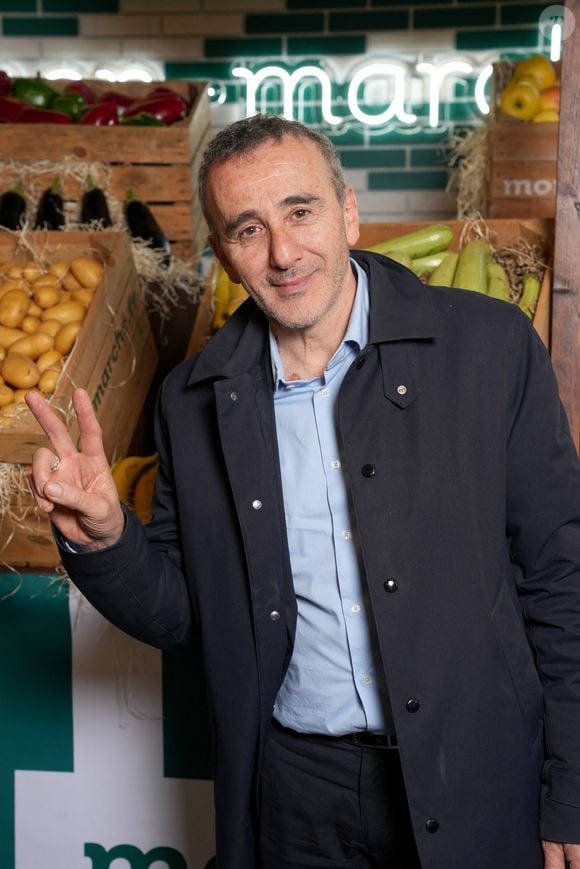 L'humoriste français aime notamment se rendre à son QG à Paris, 

Elie Semoun - Inauguration du flagship mon.marché.fr rue Réaumur à Paris le 14 avril 2026.

© Anne-Sophie Guebey / Bestimage