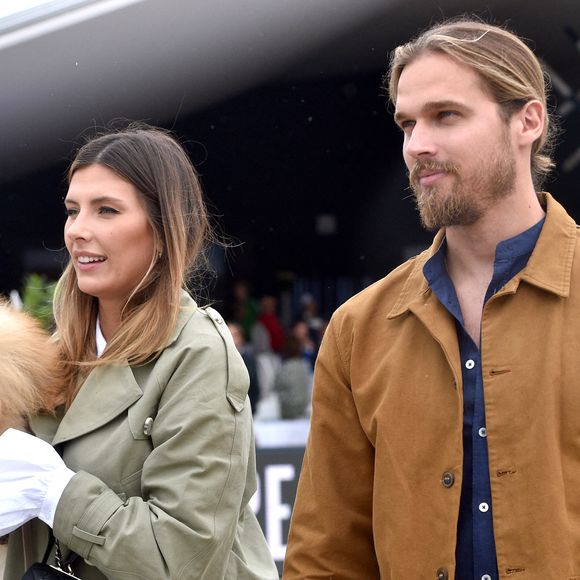 Camille Cerf et son compagnon Théo Fleury au "Longines Paris Eiffel Jumping" au Champ de Mars à Paris.

Photo : Perusseau / Gorassini / Tribeca / Bestimage