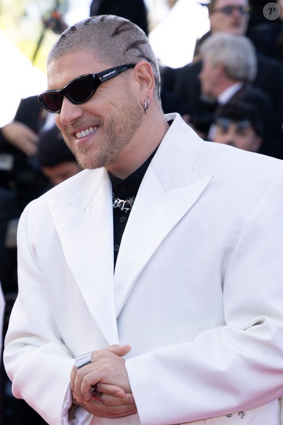 Son trophée de la Star Academy trône dans son bureau, mais il confie ne pas encore avoir vraiment "réalisé" l'avoir remporté.


Mosimann - Montée des marches du film " Karma " lors du 79ème Festival International du Film de Cannes, le 15 mai 2026. © Olivier Borde / Bestimage