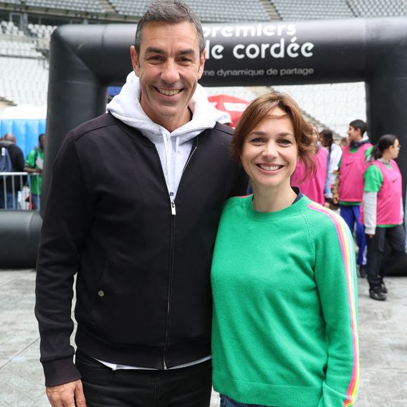 Robert Pires et Nathalie Pechalat assistent à 'La Journée Evasion' par l'association Premiers de Cordee, qui se tient au Stade de France, à St-Denis (saint-denis) près de Paris, France, le 28 mai 2025. Photo Jerome Domine/ABACAPRESS.COM
