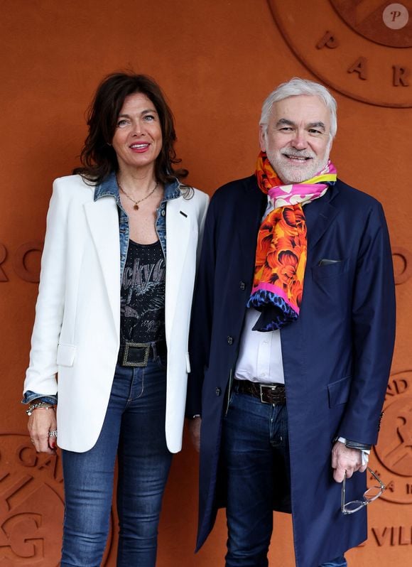 Cathy Bancarel et son compagnon Pascal Praud au village lors des Internationaux de France de tennis de Roland Garros 2024, à Paris, France, le 1er juin 2024. © Jacovides-Moreau/Bestimage