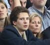 Ce jour, François Chazal - Poivre d'Arvor célèbre ses trente ans.

Exclusif - Claire Chazal avec son fils François Poivre d'Arvor et un ami le banquier Christophe de Backer assistent au quart finale de la Ligue des Champions de football au Parc des Princes entre le PSG et le FC Barcelone à Paris . © Jacovides - Moreau Bestimage