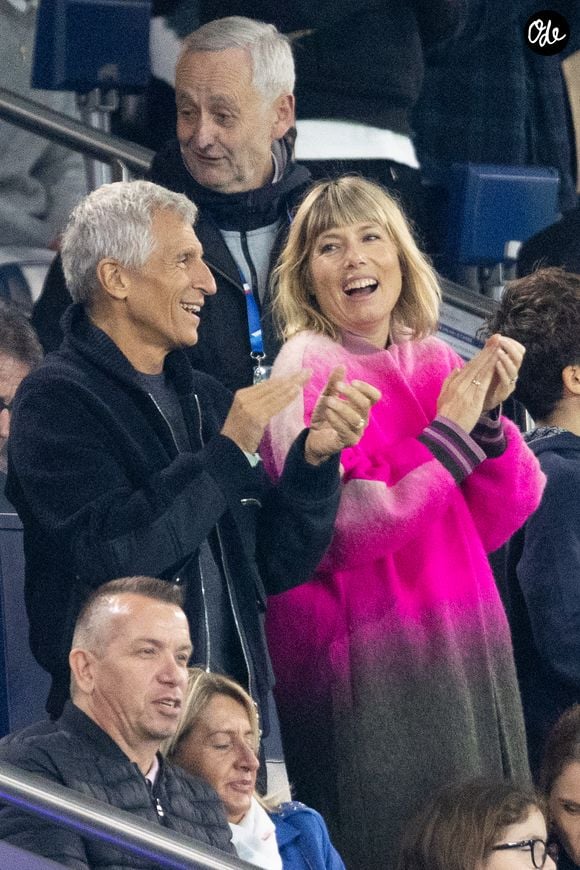 Nagui et Mélanie Page dans les tribunes du match de football de qualification pour la coupe du monde 2026 opposant la France à Azerbaïdjan (3-0) au Parc des Princes à Paris, France, le 10 octobre 2025. 

© Cyril Moreau/Bestimage