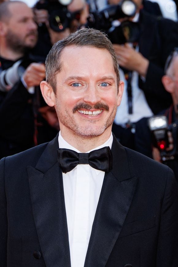 Elijah Wood - Montée des marches du film " La vénus électrique " pour la cérémonie d'ouverture du 79ème Festival International du Film de Cannes, le 12 mai 2026. © Jacovides-Moreau /Bestimage