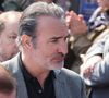 Elle écrit : "Les larmes de Jean Dujardin… Cette sublime photo de Bruno Salomone…".

Jean Dujardin - Sorties des obsèques de Bruno Salomone en l'église Sainte-Anne de Polangis de Joinville-le-Pont (Val-de-Marne) le 23 mars 2026. © Cyril Moreau - Dominique Jacovides / Bestimage