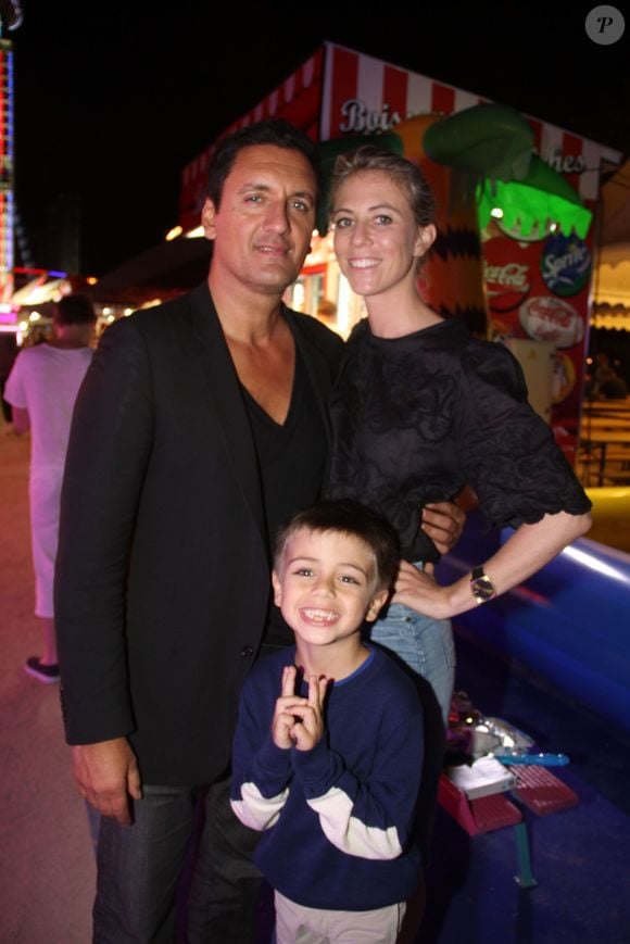 Dany Brillant,  sa femme Nathalie et leur fils Lino à l'inauguration de la fête des Tuileries organisée par Caroline Barclay le 24 juin 2016.
© Philippe Baldini / Bestimage