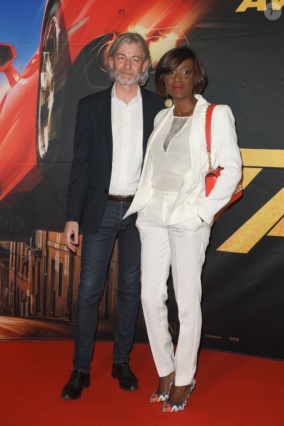 Gilles Verdez et sa compagne Fatou - Avant-première du film "Taxi 5" au cinéma le Grand Rex à Paris, France, le 8 avril 2018. © Coadic Guirec/Bestimage