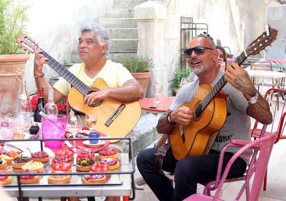 Nicolas Reyes, Christian Audigier - Exclusif - Christian Audigier et sa compagne Nathalie Sorensen en vacances au "Bistrot de Marie" lors d'un concert privé des Gipsy Kings et du chanteur Nicolas Reyes a St Remy de Provence le 17 juin 2013. © TM / BESTIMAGE