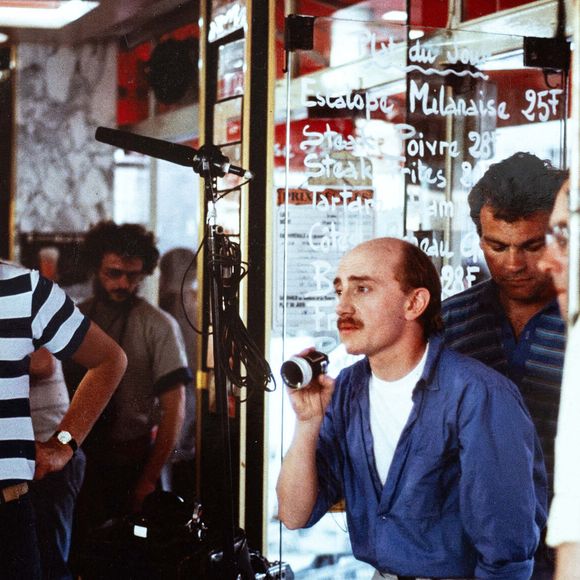 Michel Blanc lors du tournage de son premier film en tant que réalisateur "Marche à l'Ombre" dans le 15e arrondissement de Paris, France, en juin 1984. Photo par Christophe Geyres/ABACAPRESS.COM