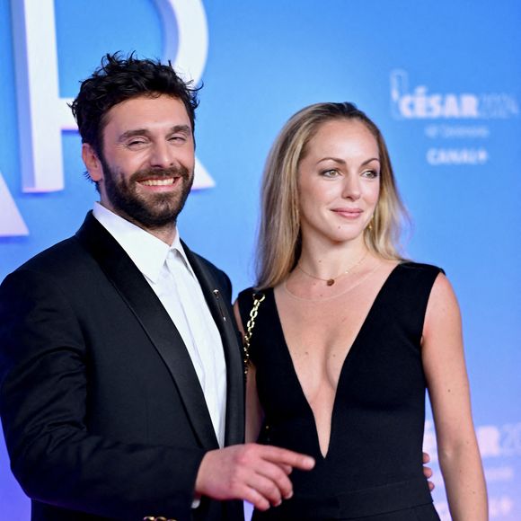 Pio Marmai et Charlotte Ranson lors de la 49e cérémonie des César du cinéma à L'Olympia le 23 février 2024 à Paris, France. Photo by Franck Castel/ABACAPRESS.COM