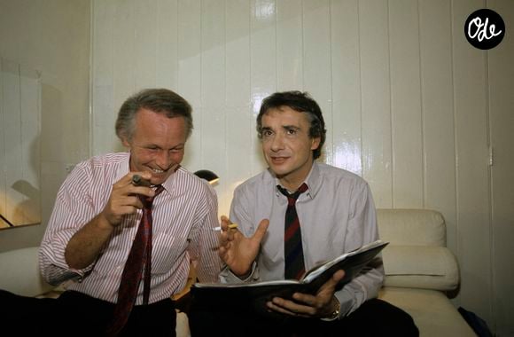 Archives - En France, à Paris, portrait de Jacques Revaux avec Michel Sardou en novembre 1986.