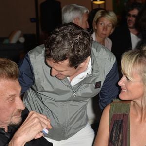 Exclusif - Guillaume Canet, Johnny Hallyday et sa femme Laeticia Hallyday - Soirée au profit de l'Association "La Bonne étoile" de Laeticia Hallyday lors du 3ème Longines Paris Eiffel Jumping à la plaine de Jeux de Bagatelle à Paris le 1er juillet 2016 dans le Pavillon Eiffel du Longines Paris Eiffel Jumping décoré par Luxury Living.
© Olivier Borde / Veeren / Bestimage