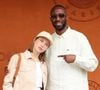 Thomas Ngijol et la jeune actrice se rendent souvent ensemble à des événements publics, comme celui de Roland-Garros. Le binôme s’est de nouveau présenté à ce tournoi majeur de tennis le samedi 6 juin 2026.

Gina Jimenez et Thomas Ngijol au photocall du village lors des Internationaux de France de Tennis de Roland Garros 2026, à Paris, France, le 6 juin 2026. © Jacovides-Moreau/Bestimage