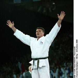 L'ancien champion de judo vit désormais avec Vanessa...

David Douillet- Judo Tournoi Olympique + 100 Kg - JO Sydney 2000 joie hauteur victoire medaille or vainqueur Alain Mounic / Panoramic / Bestimage